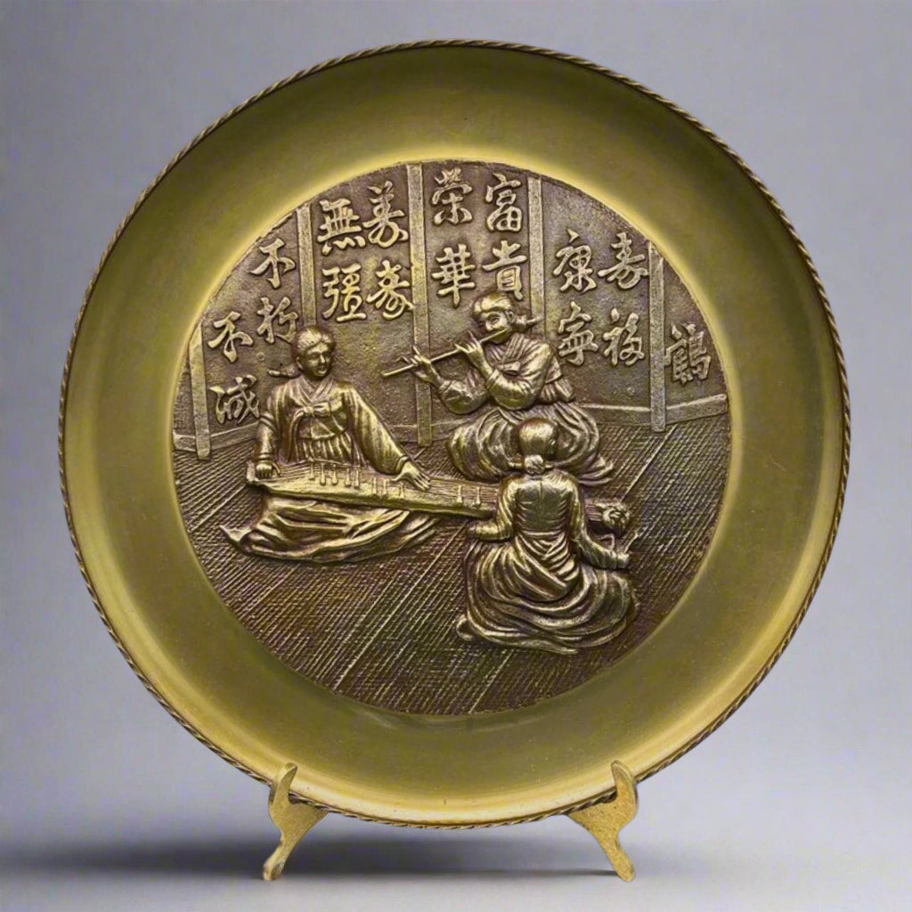 Decorative plate with intricate design on a stand
