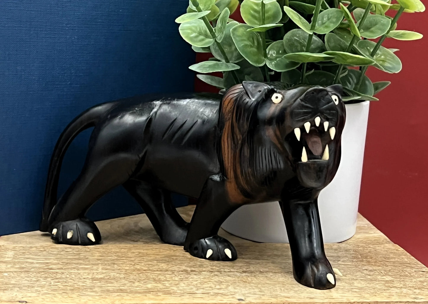Hand-Carved Ebony Lion Sculpture with Bone Accents 7-Inch Art Decor