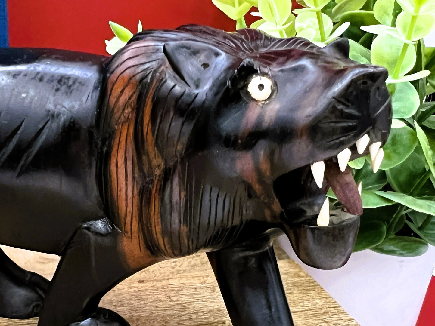 Hand-Carved Ebony Lion Sculpture with Bone Accents 7-Inch Art Decor
