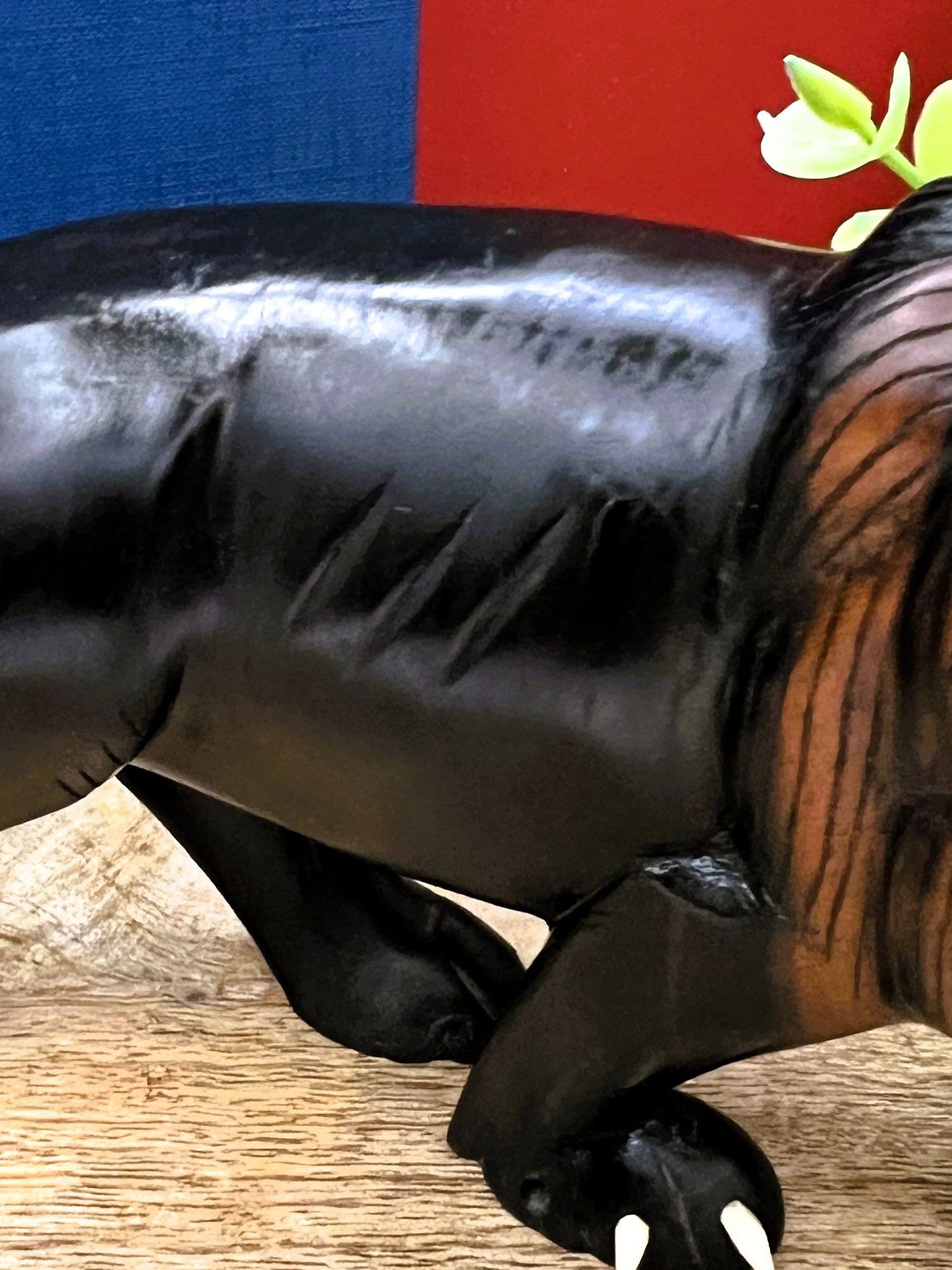 Hand-Carved Ebony Lion Sculpture with Bone Accents 7-Inch Art Decor