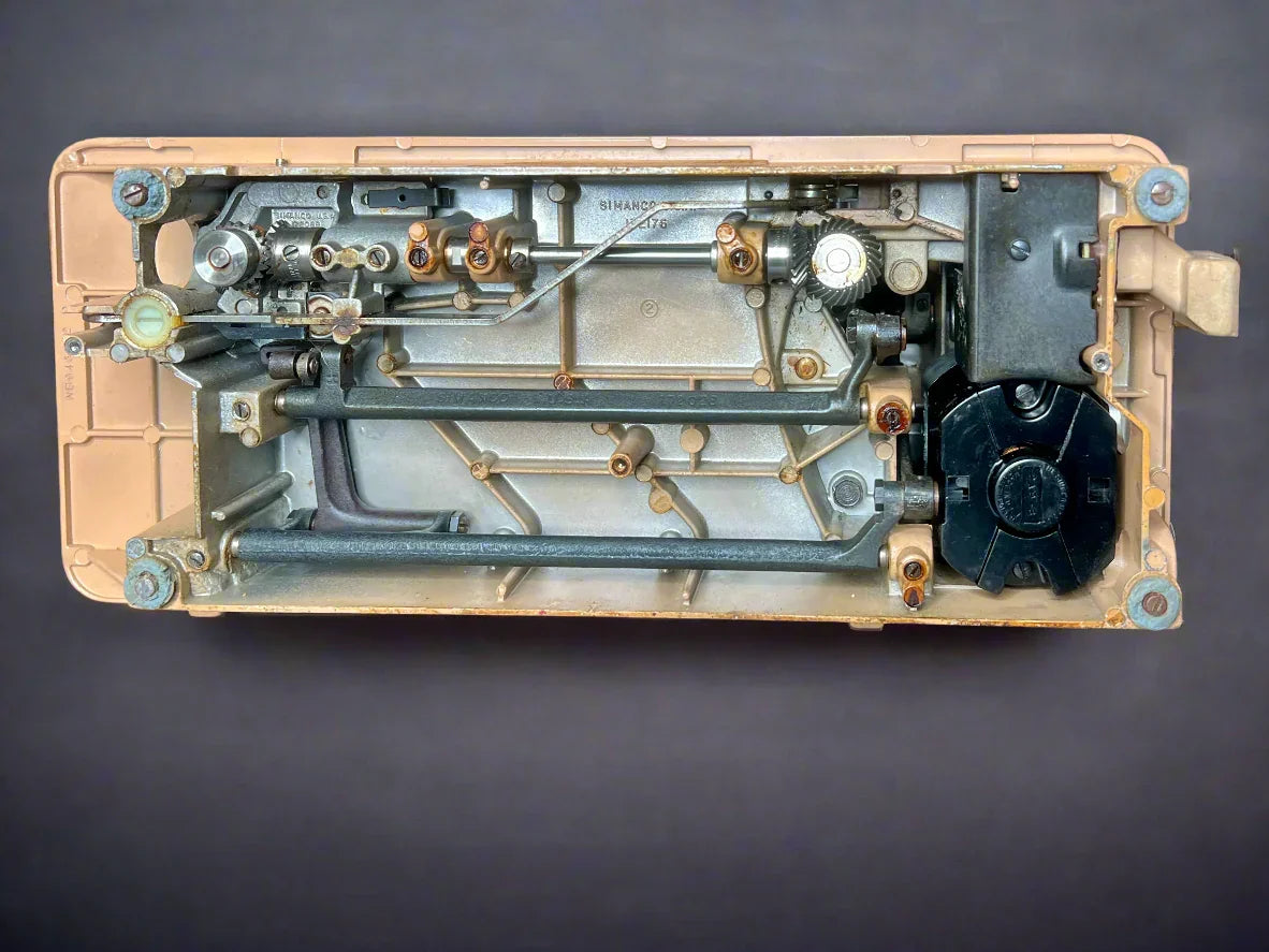 Mechanical components of a vintage Singer 403A Slant-o-Matic sewing machine