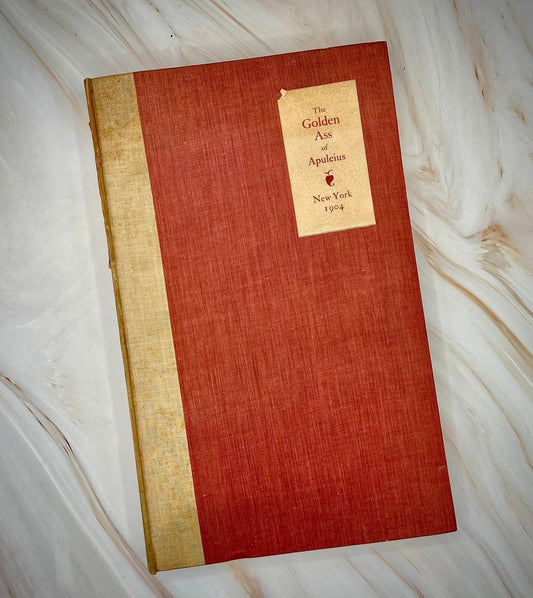 Front cover of the 1904 Chiswick Press edition of The Golden Ass of Apuleius, showing the aged vellum binding.