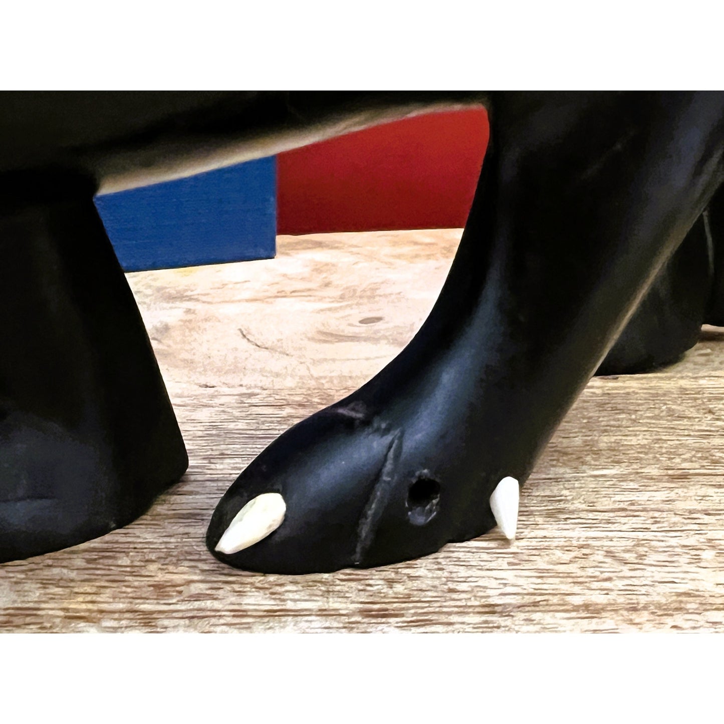 Hand-Carved Ebony Lion Sculpture with Bone Accents 7-Inch Art Decor