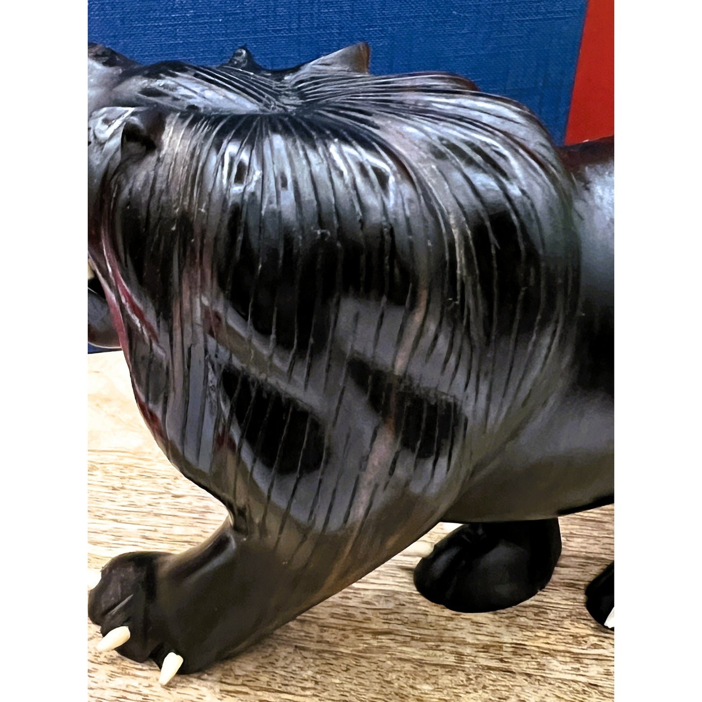 Hand-Carved Ebony Lion Sculpture with Bone Accents 7-Inch Art Decor
