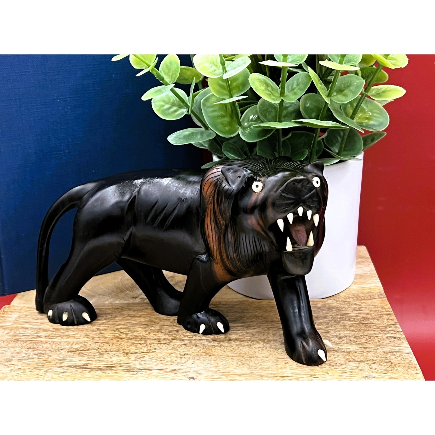 Hand-Carved Ebony Lion Sculpture with Bone Accents 7-Inch Art Decor