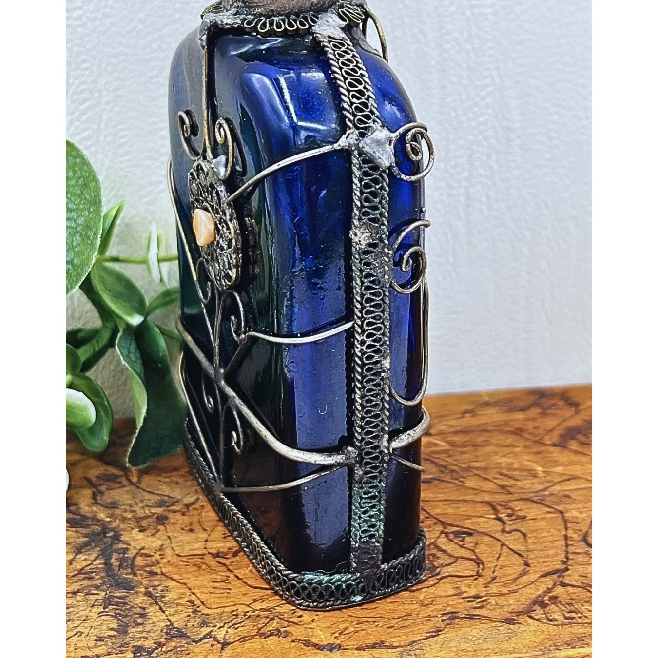 Blue Glass Perfume Bottle with Ornate Silver Design