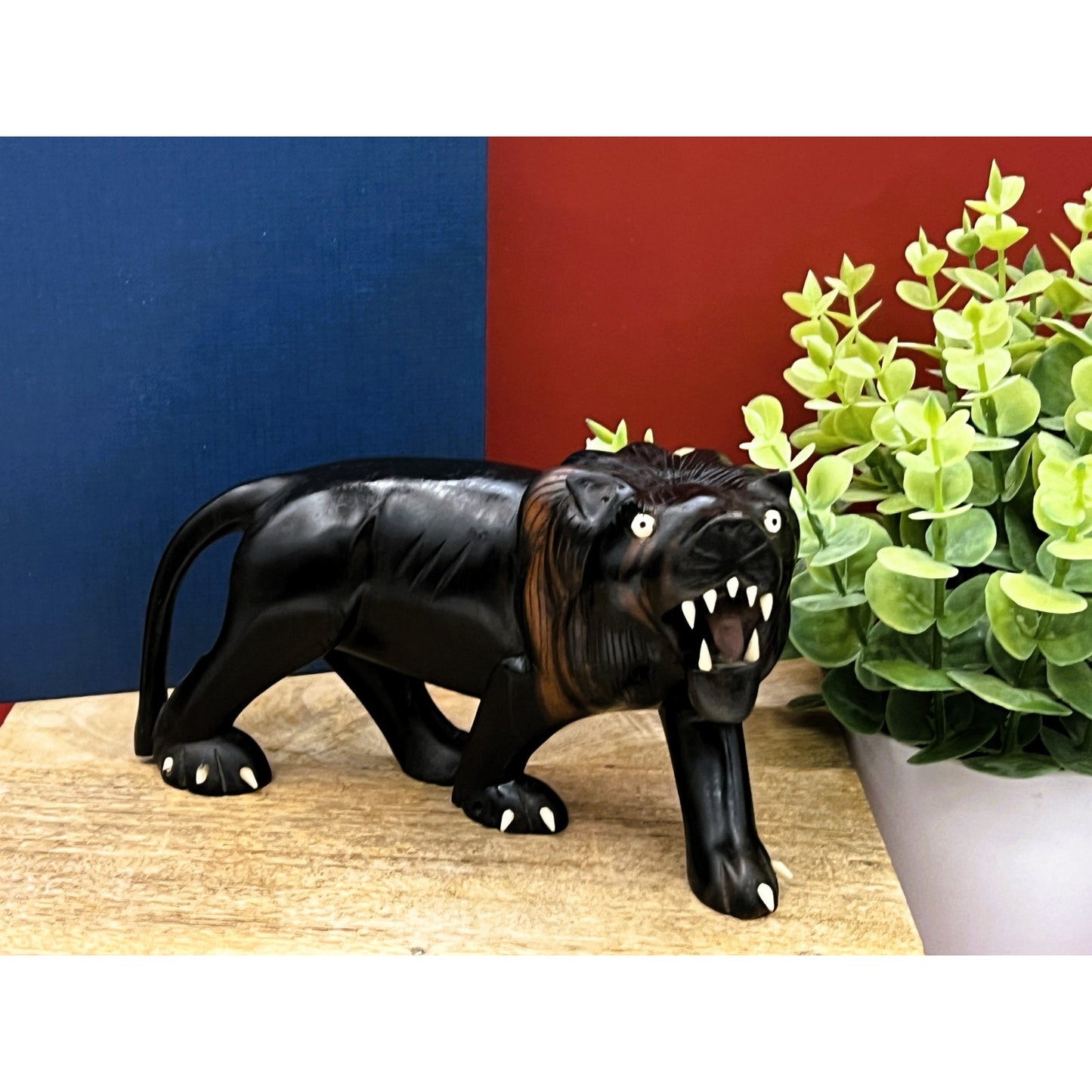 Hand-Carved Ebony Lion Sculpture with Bone Accents 7-Inch Art Decor