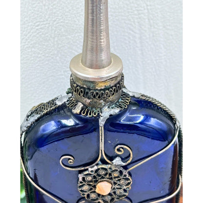 Blue Glass Perfume Bottle with Ornate Silver Design