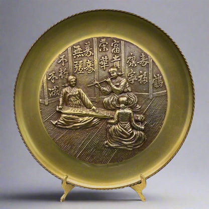 Decorative plate with intricate design on a stand