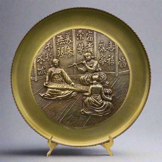 Decorative plate with intricate design on a stand