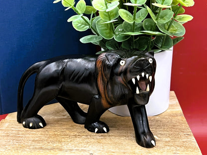 Hand-Carved Ebony Lion Sculpture with Bone Accents 7-Inch Art Decor