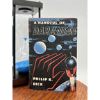 Book titled 'A Handful of Darkness' by Philip K. Dick