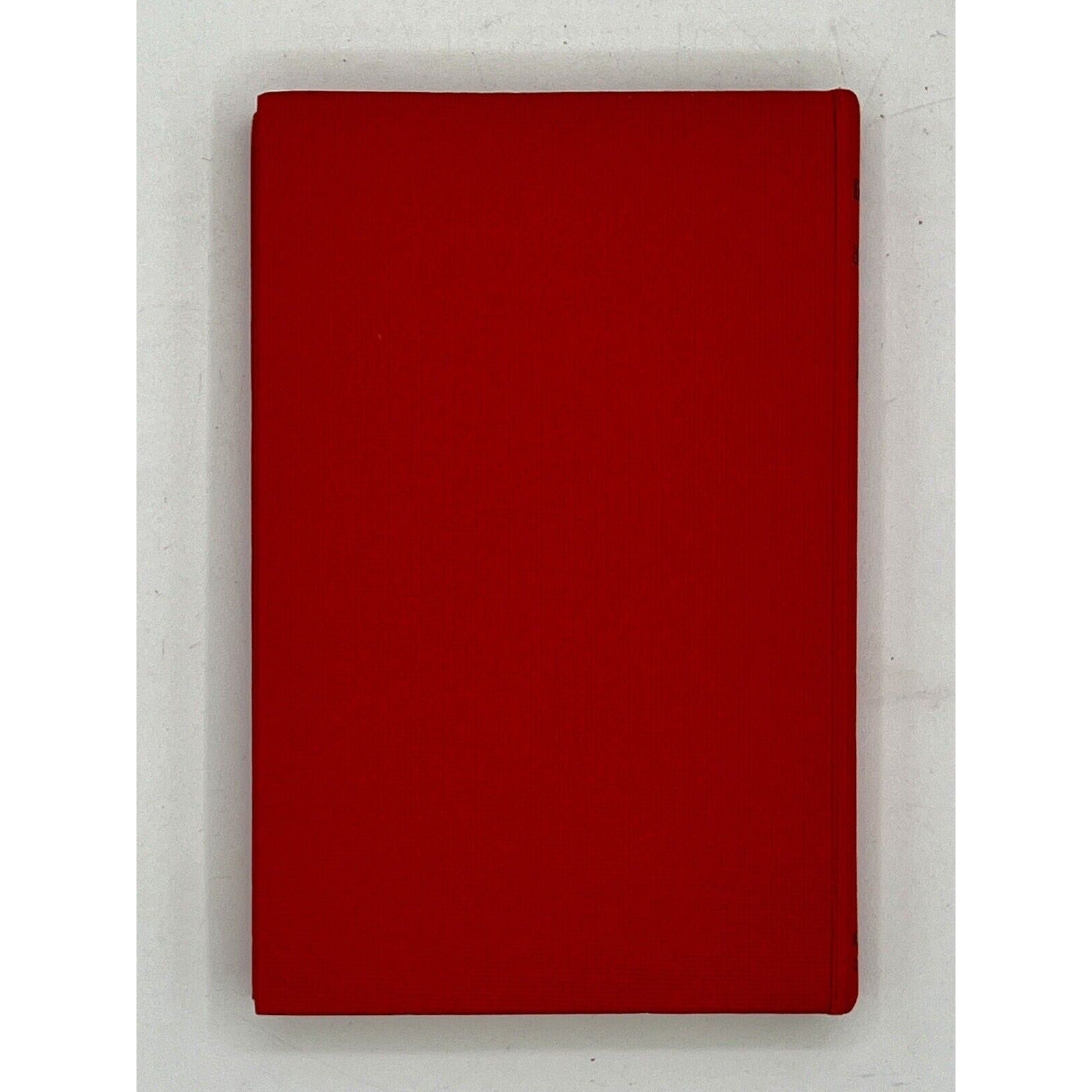 Red book on a white background