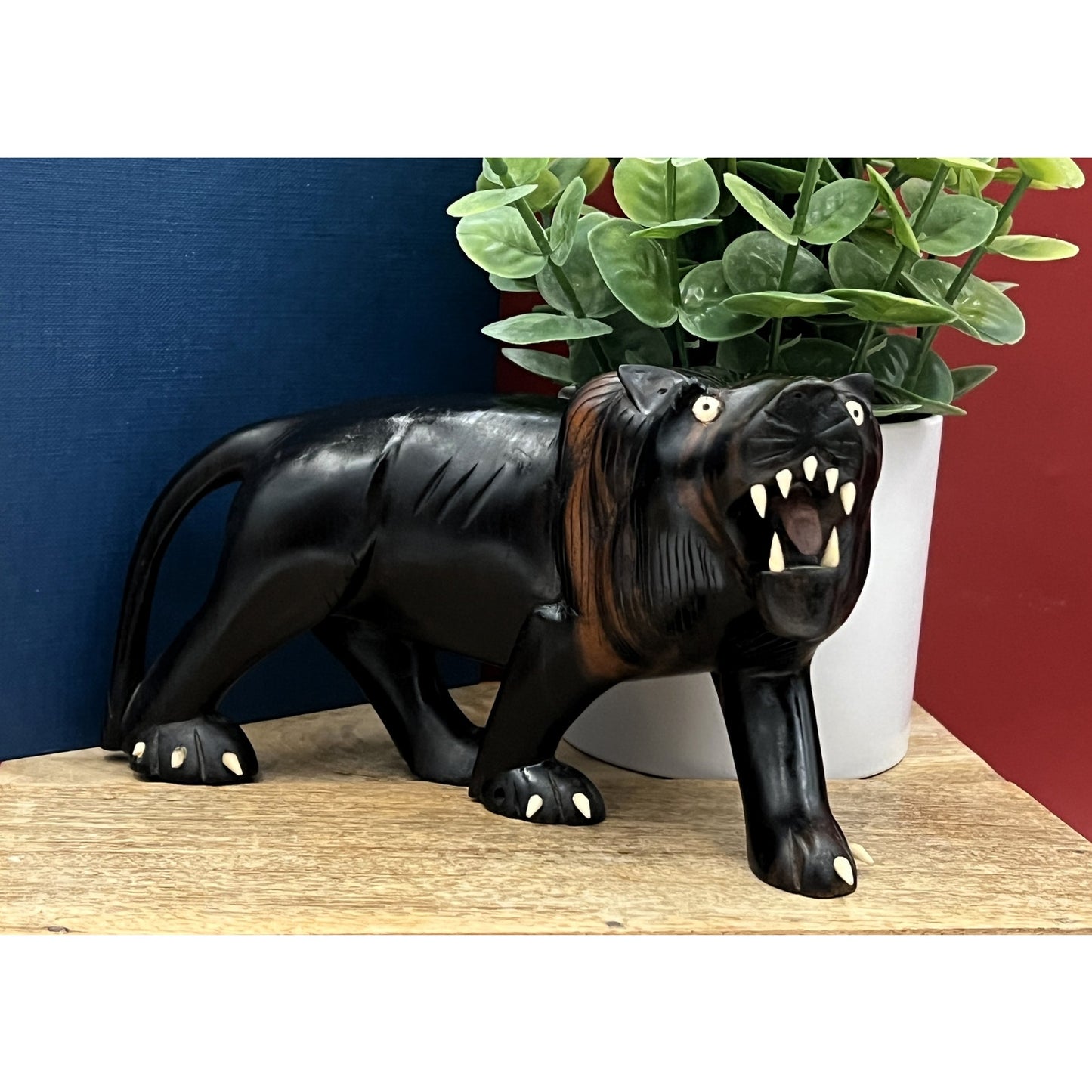 Hand-Carved Ebony Lion Sculpture with Bone Accents 7-Inch Art Decor