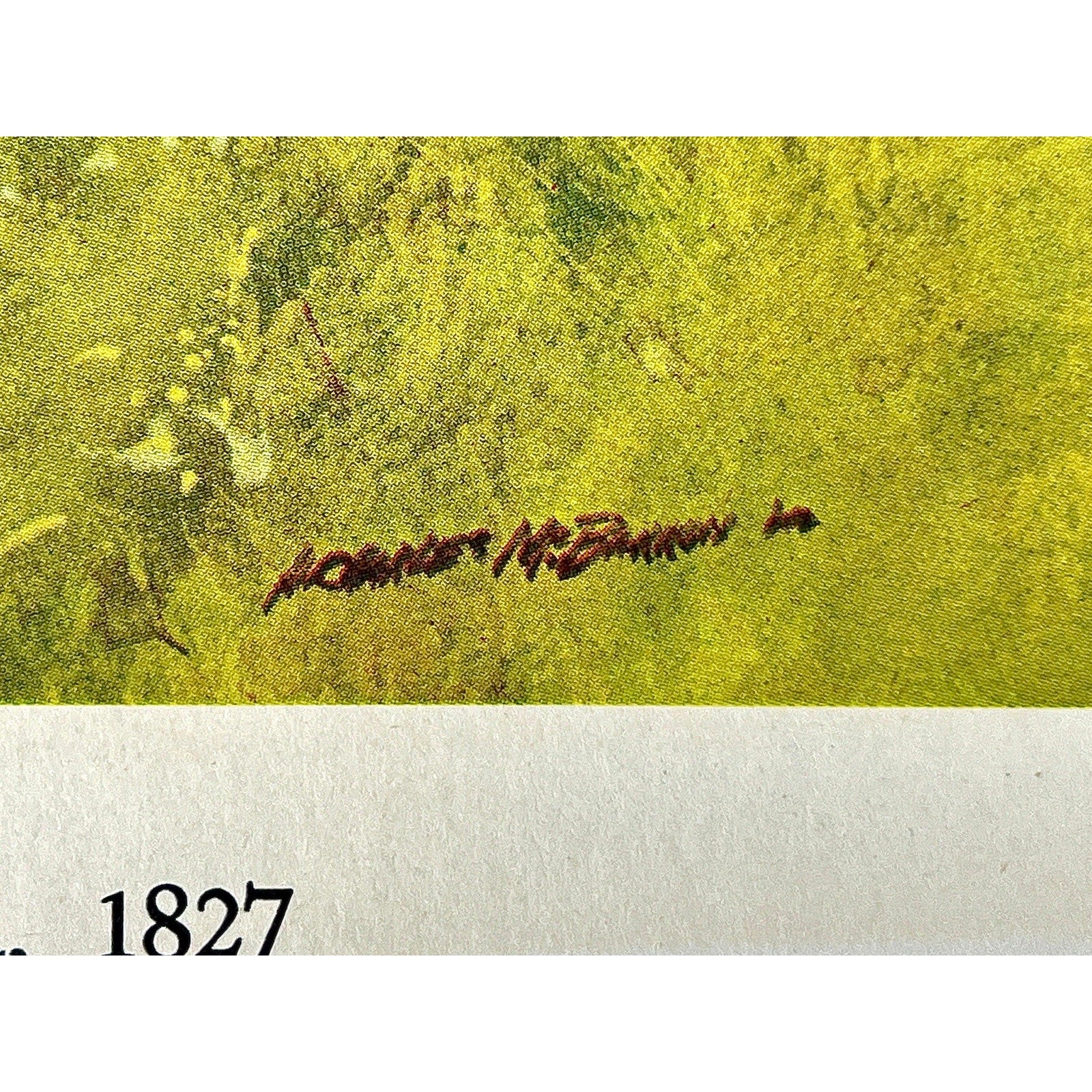 Red artist signature on yellow background from a vintage American military lithograph; 1827 visible.