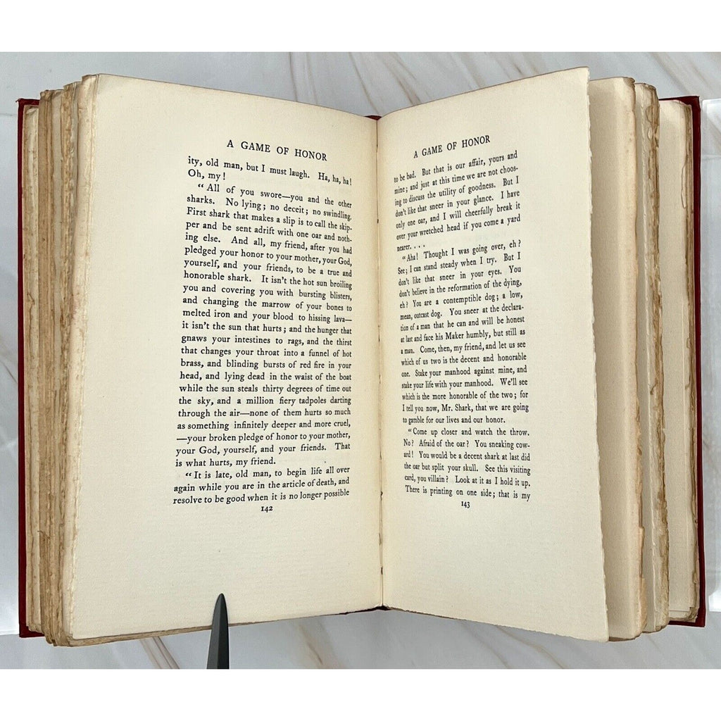 Open 1897 first edition of The Ape, The Idiot & Other People by W. C. Morrow, pages show 'A Game of Honor'.