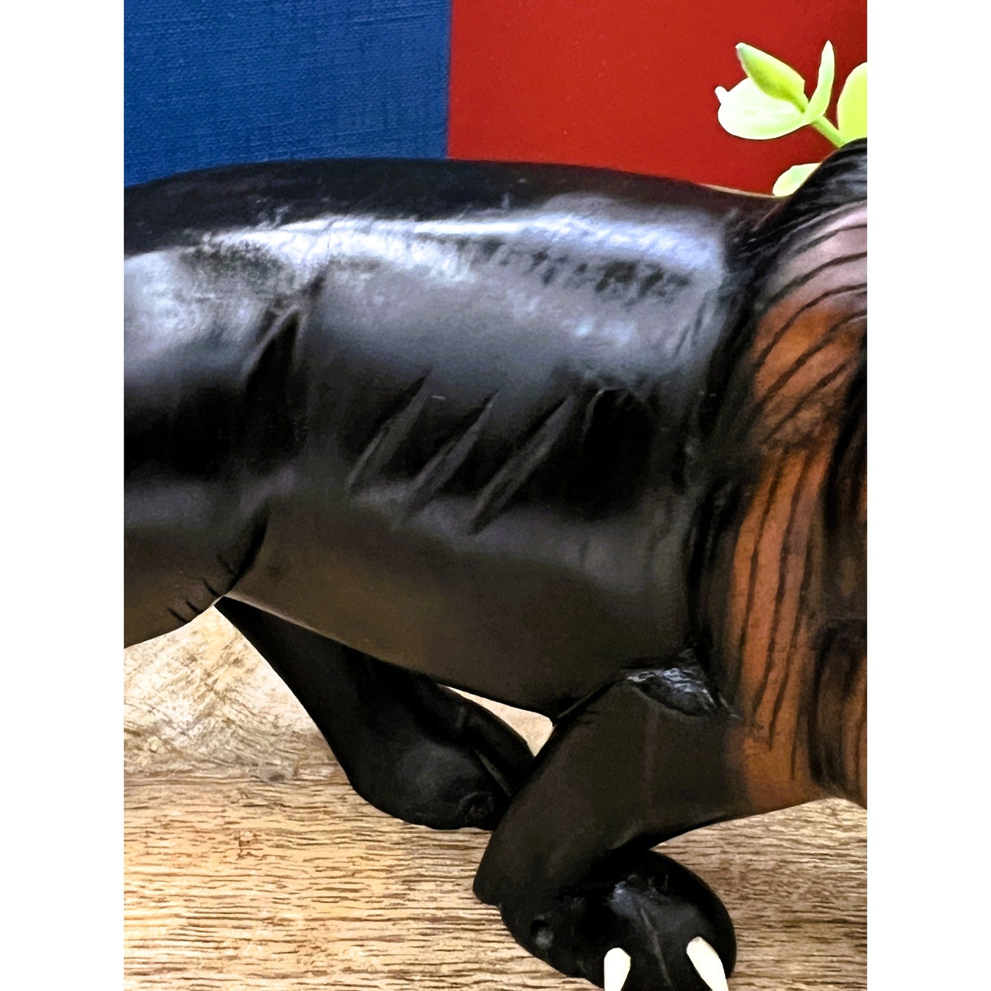 Hand-Carved Ebony Lion Sculpture with Bone Accents 7-Inch Art Decor