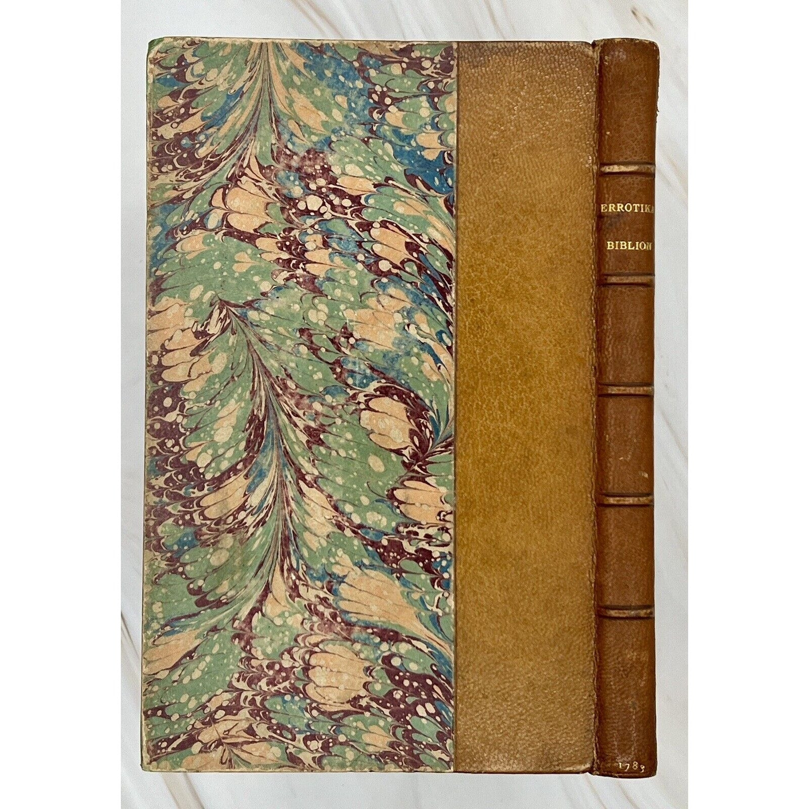 Errotika Biblion by Mirabeau, 1783 first edition, leather-bound with marbled boards, good condition.