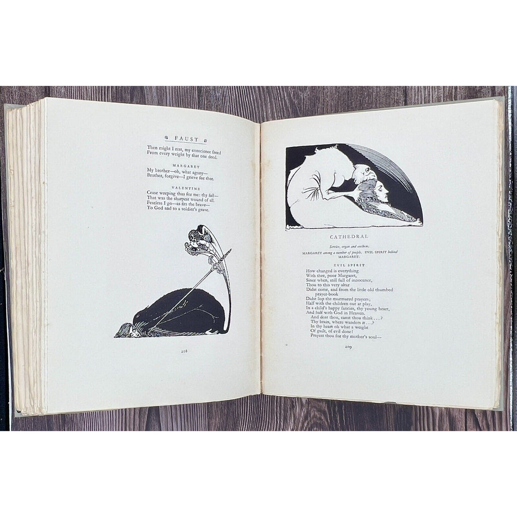 Open copy of Faust by Goethe (1925), illustrated by Harry Clarke, signed edition with black-and-white plates.