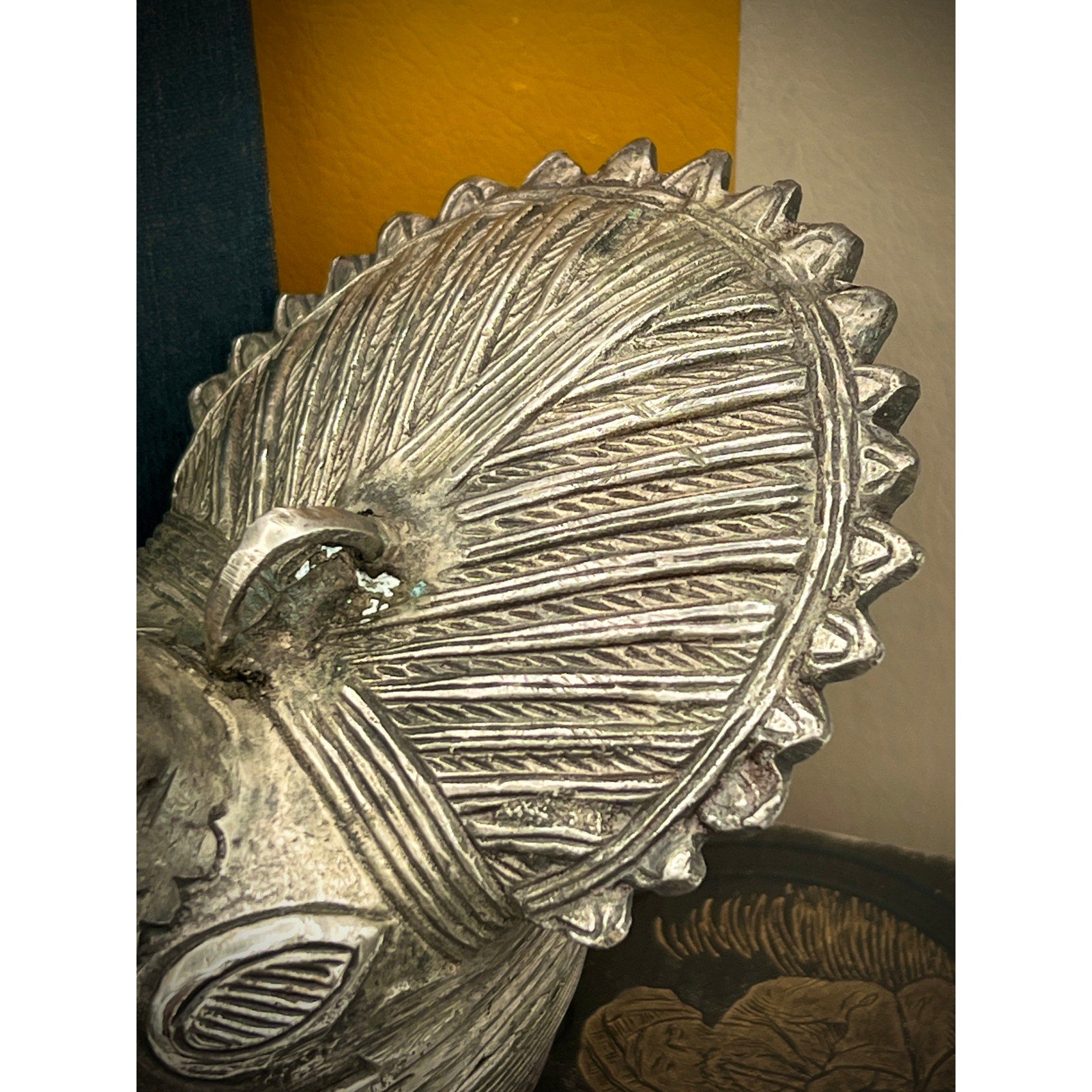 Decorative metal wall piece with intricate design