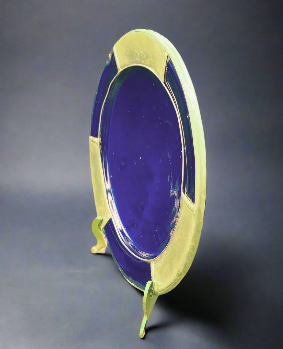 Blue and gold circular object on a white background