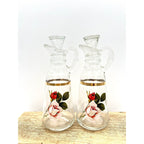Pair of 6-inch Radiant Rose glass oil and vinegar cruets with floral design and handles